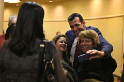 San Jose's 65th Mayor Sam Liccardo takes a picture with supporters after his inauguration.