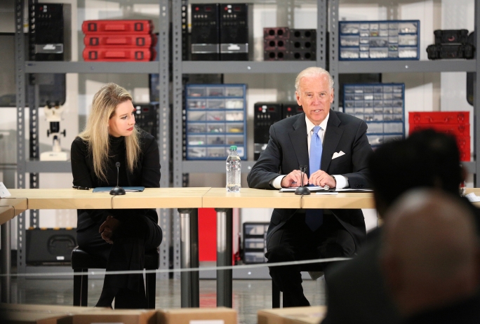 Theranos founder, Elizabeth Holmes and U.S. Vice President Joe Biden speaking at the company's lab in Newark, Calif., on July 23, 2016.